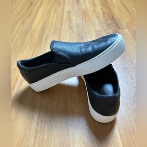 UGG Women’s Black Leather Moccasins with White Soles Size 7